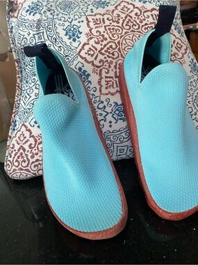 Light Blue Slip-On Knit Women's walking city shoe.